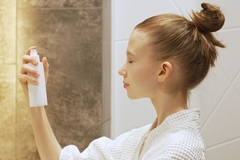 Image tween sprays face with face mist