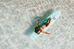 Woman on a surfboard in the sea