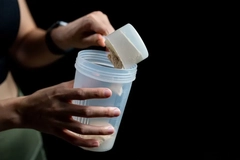 Image woman making protein shake