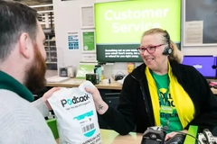 A person and person at a store