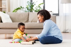 Image Mother playing with child