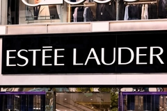 Image Estée Lauder logo against a building front
