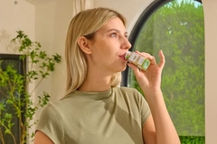 Image Woman drinking Magic Mind beverage
