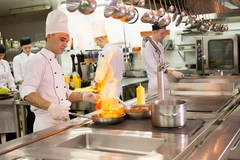 Image chefs working in professional kitchen