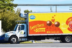 Image yellow and red danone truck