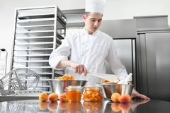 Image Chef making jam from real fruit.