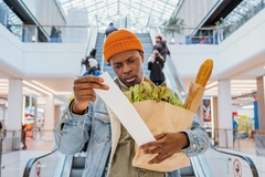 Energy food inflation Europe Rabobank Food inflation, man checking shopping receipt.