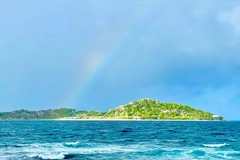 Image Island with rainbow in background