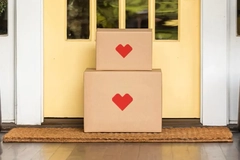 Two boxes in front of a door