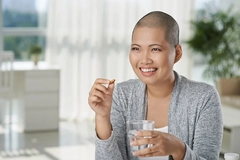 Cancer patient taking supplements