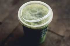 A cup with a sip-through lid