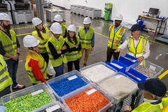 workers learning recycling