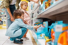 Kids looking at toys in a store