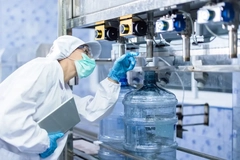 Image scientist looking at packaging