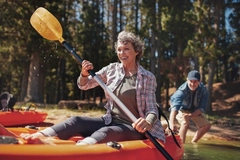 Healthy active senior in a kayak