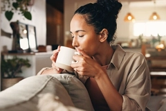 Relaxed woman drinking tea