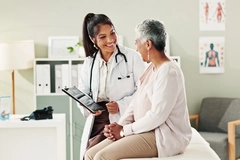 Woman and female doctor