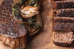 plant based steak on a wooden board plant based steak on a wooden board