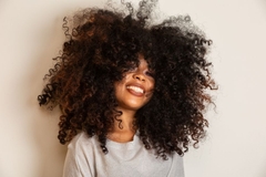 Image curly haired woman