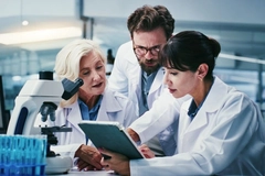Researchers discussing microbiome science