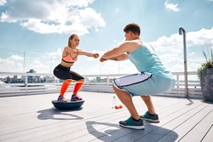 Image Man and woman exercising outside