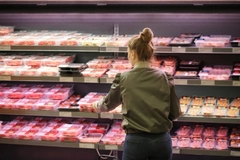 Image Woman shopping for meat.