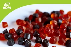 Banner with colorful gummies and ADM logo