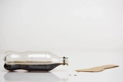 Spilled bottle of cola