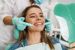 Image woman at dentist office getting treatment