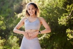 Image Woman holding her stomach