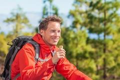 Image Man eating nutrition bar