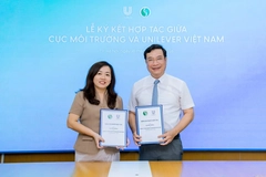 Image Two people smiling into the camera