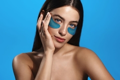 woman with blue silicone eye masks on