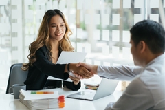 Image woman shaking hands with man