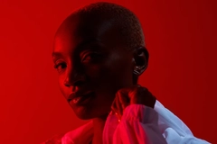 Woman with red background