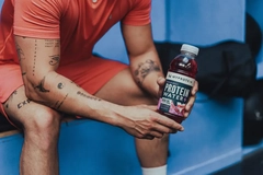 Image Person holding Myprotein water
