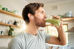 Image Man drinking fiber supplement