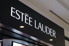 Image Estée Lauder logo against a building front