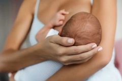 Image woman breastfeeding her baby