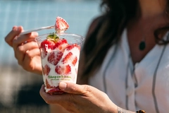 Image Woman eats chia pudding from Go-Pak cup