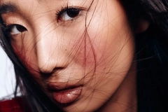 Image Woman with her hair blowing in her face