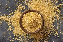 Image Uncooked yellow millet