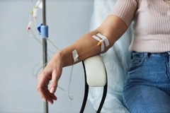 Image woman getting iron IV infusion
