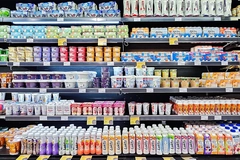 Healthy bio dairy products on shelf of supermarket.