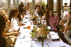 Image people sat at table at IPSY business brunch