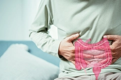 Man with healthy gut holding stomach.