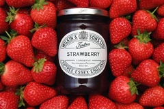 Image A jar on strawberries