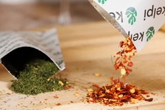 Image Two bags with seasonings and toppings inside