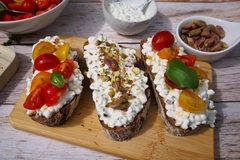 Image Dairy-free cheese spread on bread.