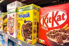 Image Cereal packs in store aisle.